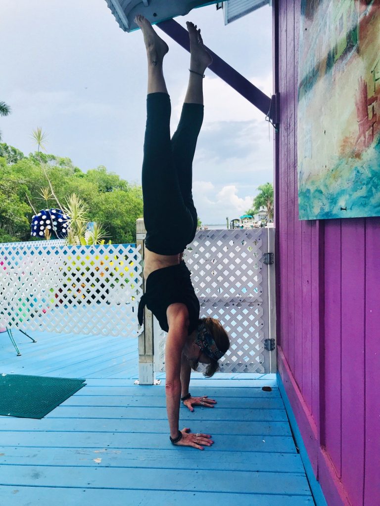 My handstand goal by age 60 is to do a freestanding handstand. I can get myself upside down at nearly 56, but now I want to hold it and play around.